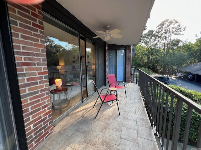 balcony featuring ceiling fan