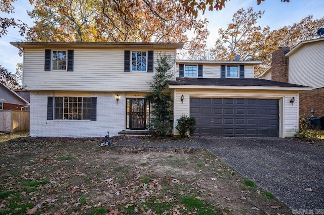 front of property with a garage