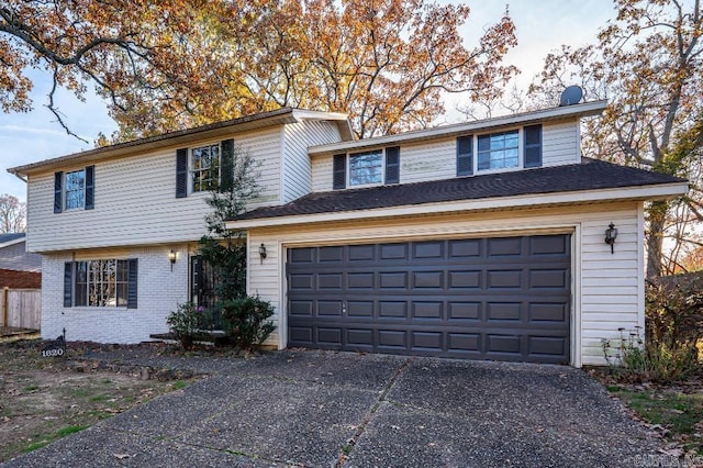 front facade with a garage