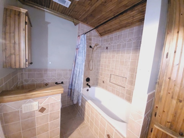 bathroom featuring wooden ceiling, shower / bathtub combination with curtain, and tile patterned floors