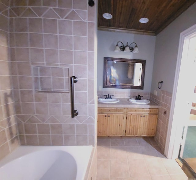 bathroom with a relaxing tiled tub, vanity, wood ceiling, and tile patterned flooring