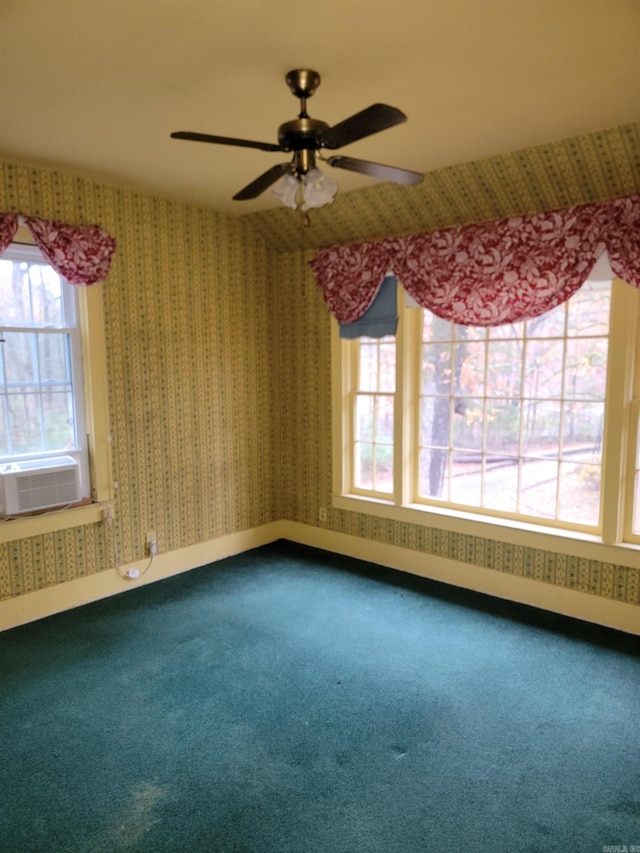 unfurnished room with ceiling fan, cooling unit, and carpet