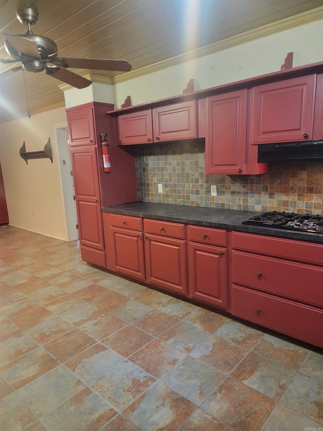 kitchen with black gas stovetop, decorative backsplash, ornamental molding, and ceiling fan