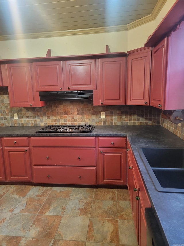 kitchen featuring sink, backsplash, black gas cooktop, and crown molding