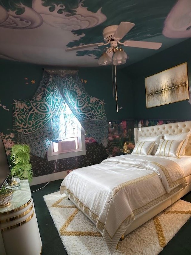 bedroom featuring ceiling fan, cooling unit, and dark carpet