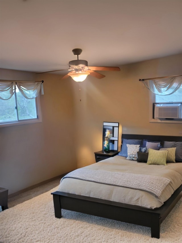 bedroom featuring ceiling fan, carpet, and cooling unit