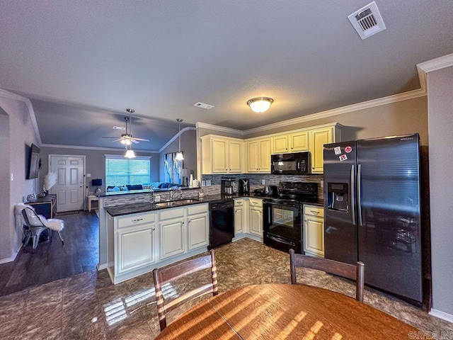 kitchen with kitchen peninsula, ornamental molding, ceiling fan, black appliances, and hanging light fixtures