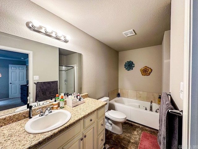 full bathroom featuring separate shower and tub, vanity, a textured ceiling, and toilet