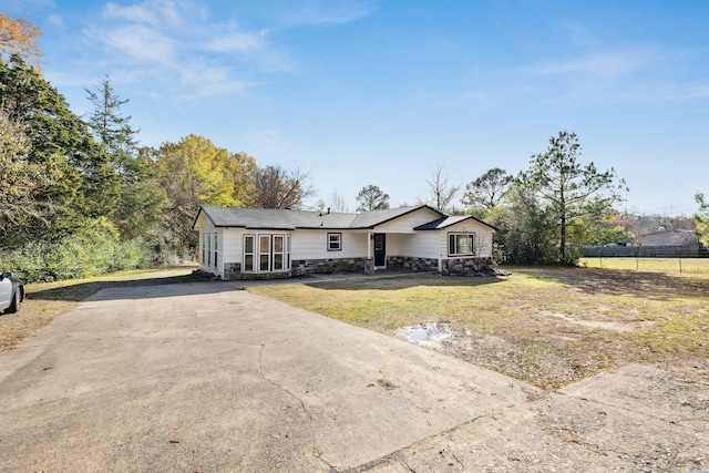 view of front of home with a front yard