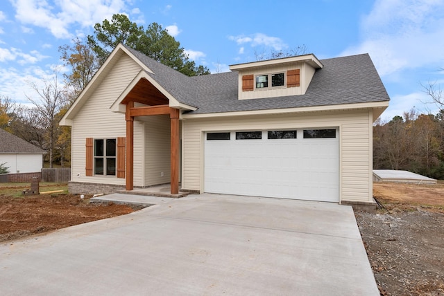 view of front of property featuring a garage