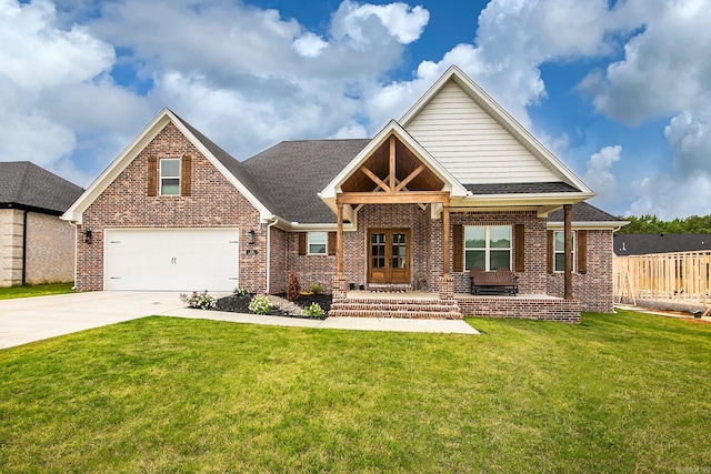 view of front of property with a porch, a garage, and a front lawn