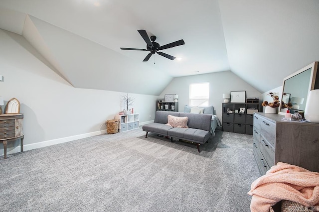 interior space featuring light carpet, ceiling fan, and lofted ceiling