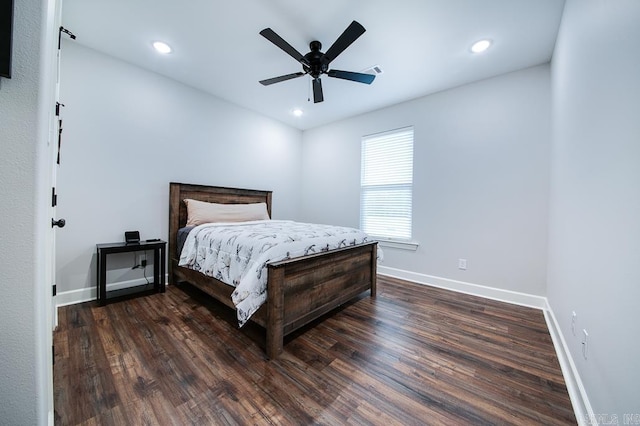 bedroom featuring ceiling fan and dark wood-type flooring