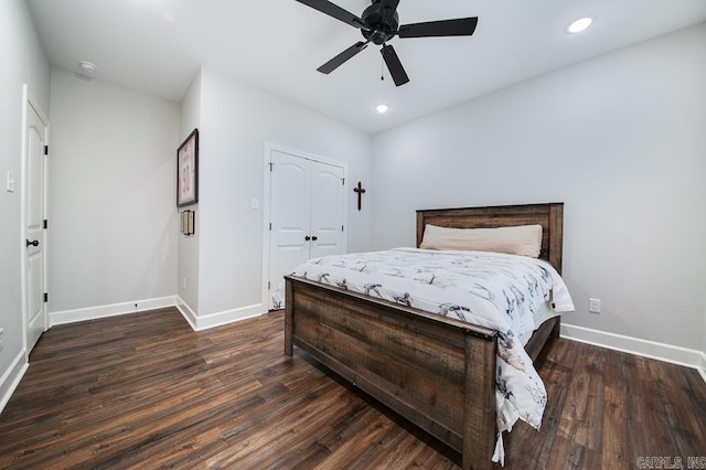 bedroom featuring ceiling fan, a closet, and dark hardwood / wood-style floors