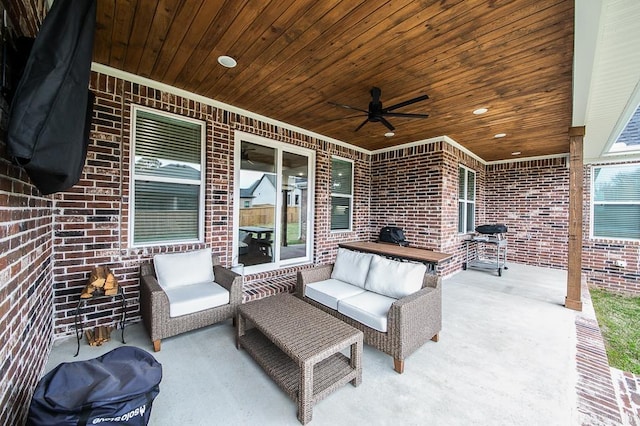 view of patio featuring ceiling fan