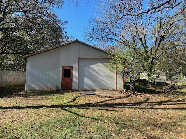 garage with a lawn