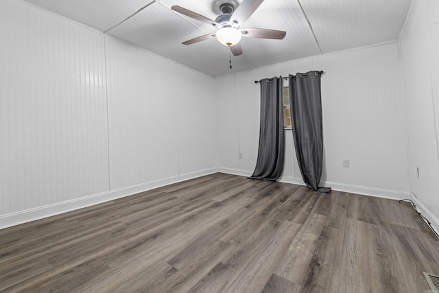 unfurnished room with hardwood / wood-style floors and ceiling fan