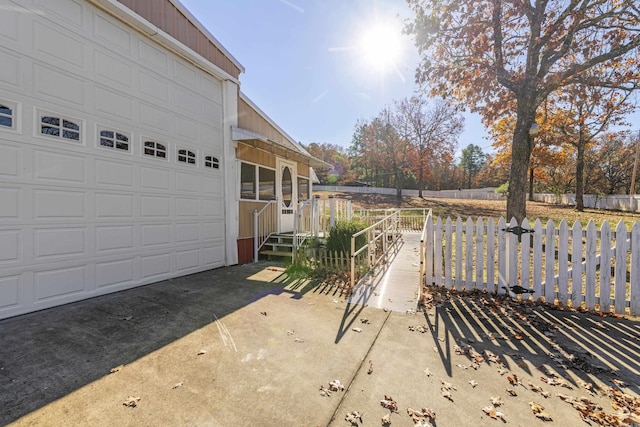 exterior space with a garage