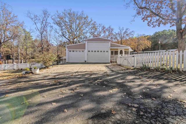 view of side of home with a garage