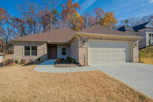 single story home featuring a garage