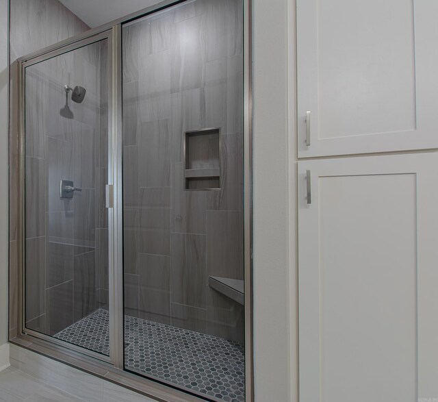 bathroom featuring walk in shower