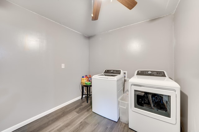 laundry area featuring hardwood / wood-style floors, ceiling fan, and washing machine and dryer