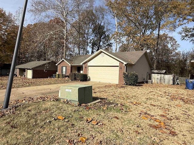 ranch-style house featuring a garage