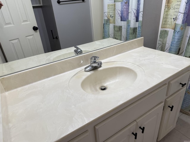 bathroom featuring vanity and tile patterned floors