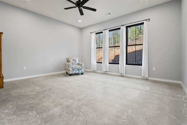 unfurnished room with carpet flooring and ceiling fan