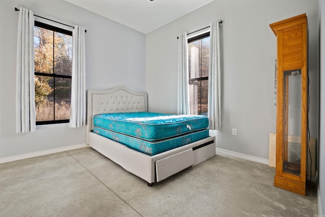 bedroom with concrete floors