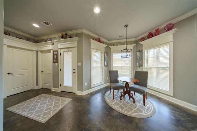 dining space featuring crown molding and a notable chandelier