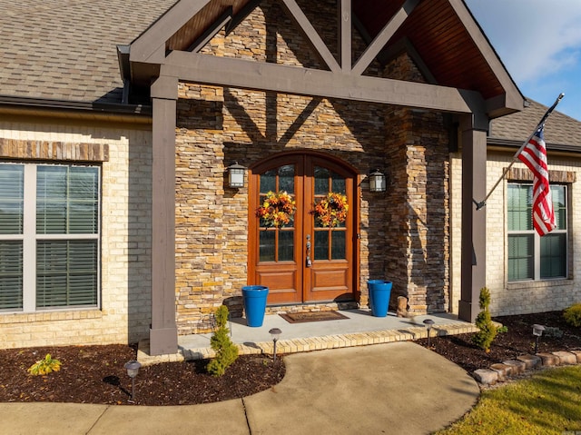 entrance to property featuring french doors