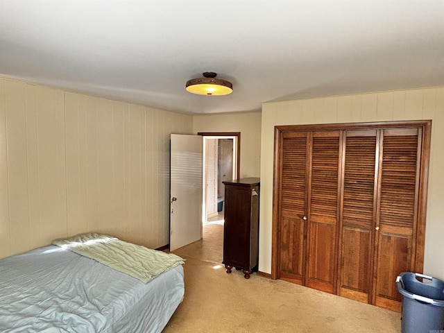 carpeted bedroom with a closet