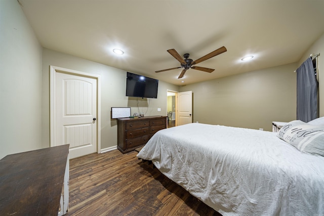 bedroom featuring ceiling fan and dark wood-type flooring