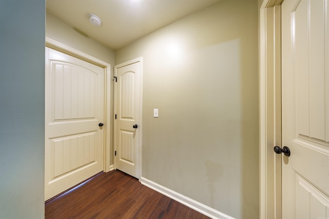 hall featuring dark hardwood / wood-style floors