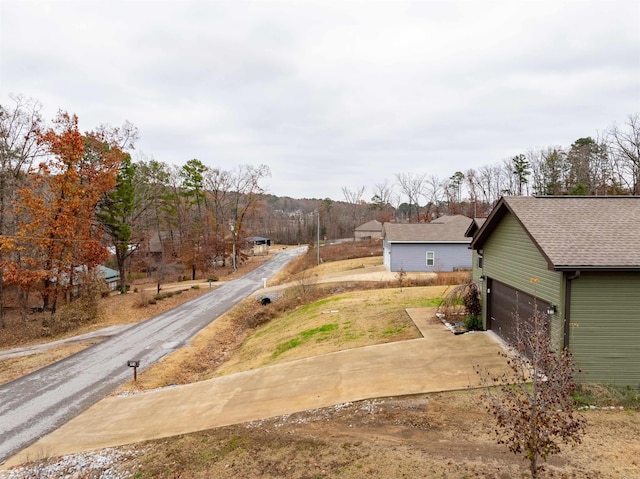 view of yard with a garage