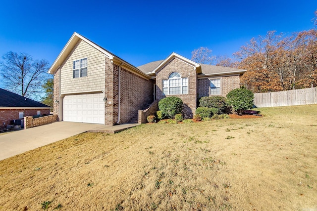 front of property with a garage and a front yard