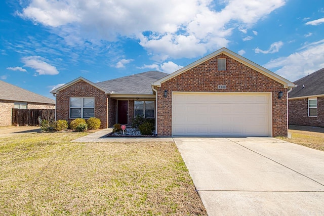 5900 Willow Way, Sherwood, AR 72117 - ranch-style house with brick siding, concrete driveway, and a garage