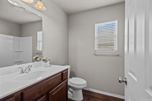 5900 Willow Way, Sherwood, AR 72117 - full bath with wood finished floors, vanity, and a shower