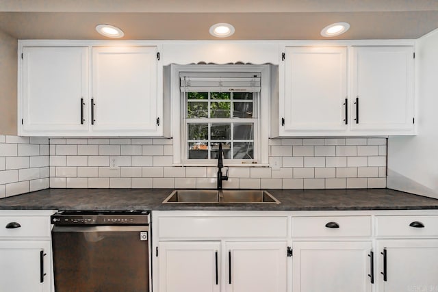 kitchen with white cabinets, dishwasher, decorative backsplash, and sink