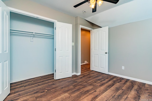 unfurnished bedroom featuring dark hardwood / wood-style flooring, a closet, and ceiling fan