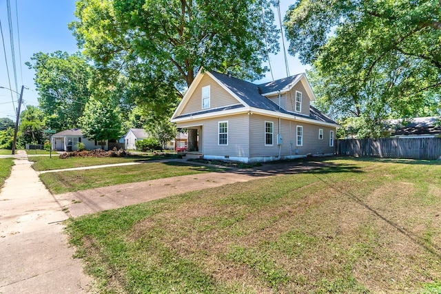 view of front facade with a front yard