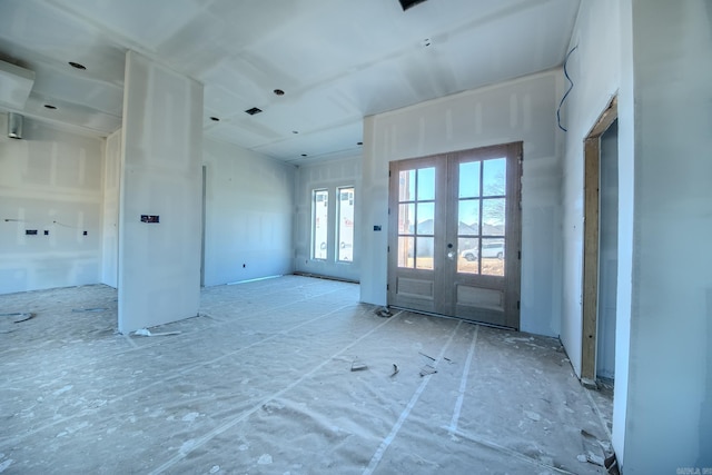 empty room featuring french doors