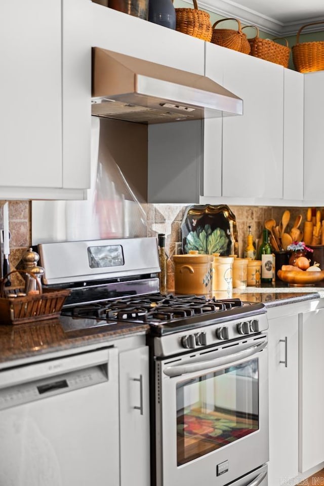 kitchen featuring white cabinets, white dishwasher, stainless steel range with gas cooktop, and extractor fan