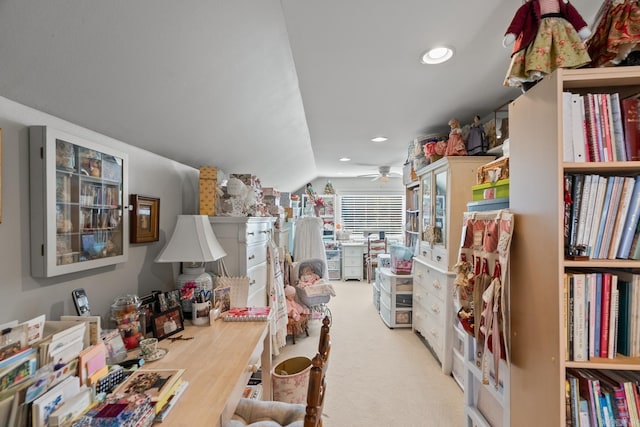 interior space with vaulted ceiling and ceiling fan