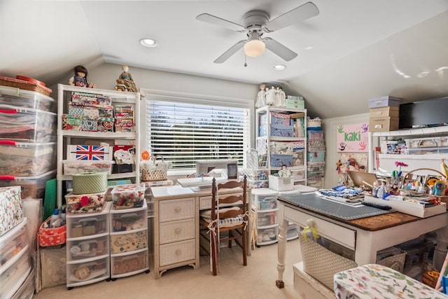 office space with light carpet, vaulted ceiling, and ceiling fan