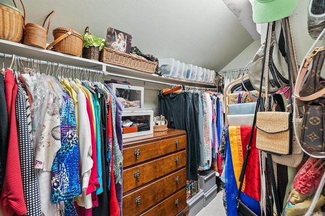 spacious closet with lofted ceiling