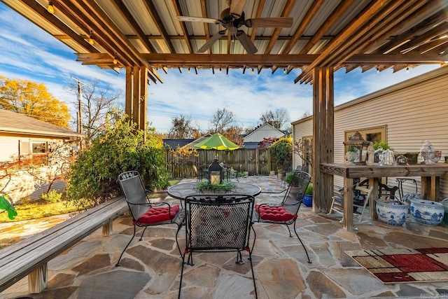 view of patio featuring ceiling fan