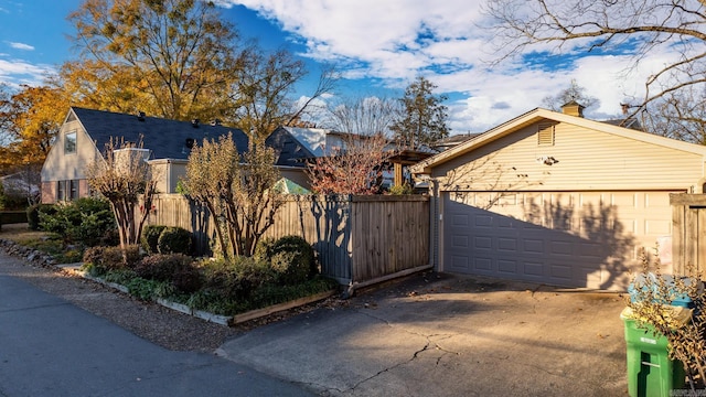 view of home's exterior with a garage