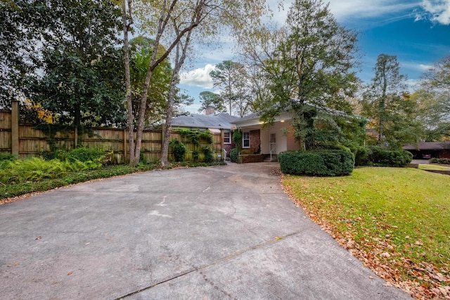 view of front of home with a front yard